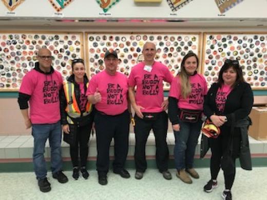 lakewood supervisors in pink shirts